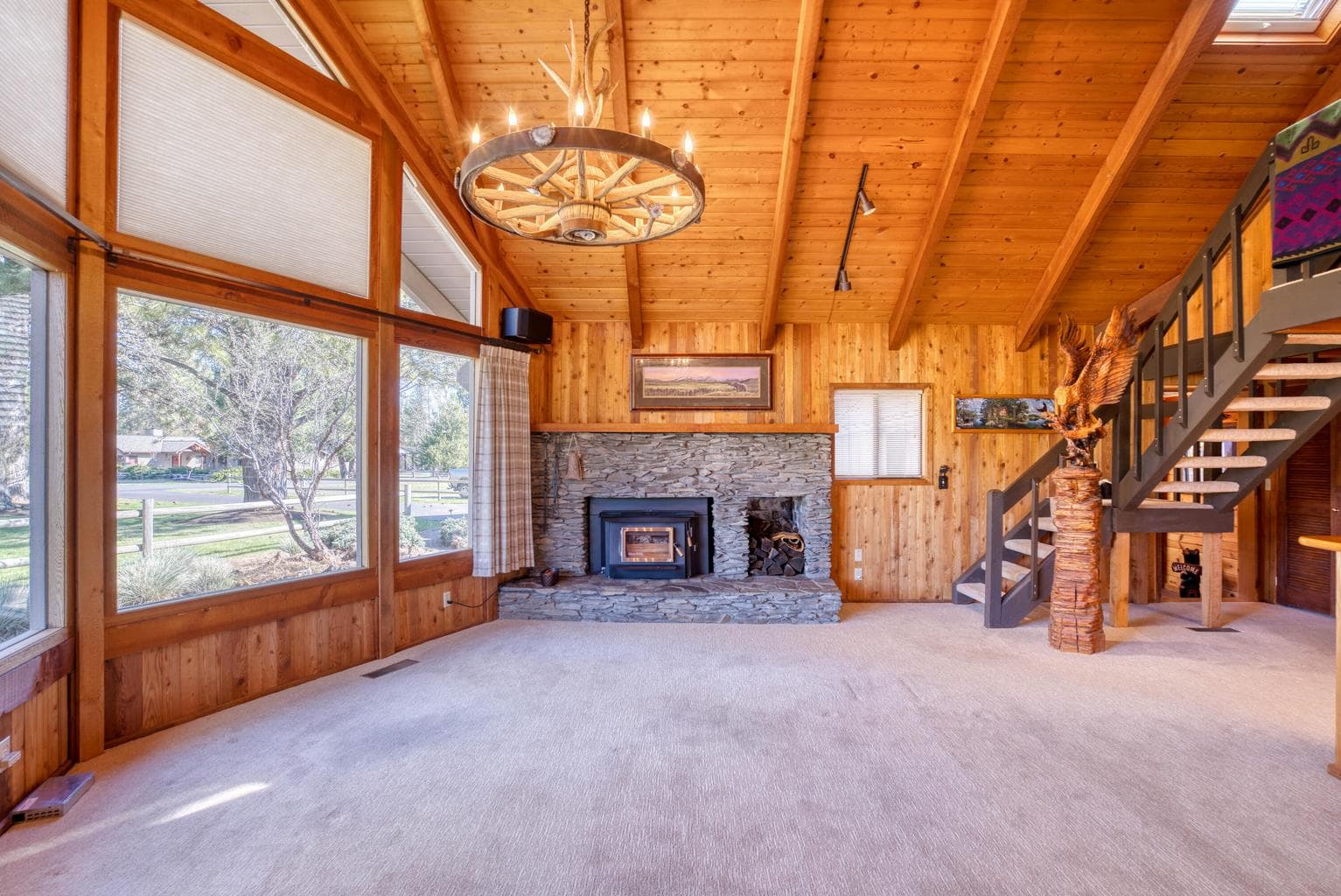 Beautiful window wall, stone hearth and vaulted ceilings.