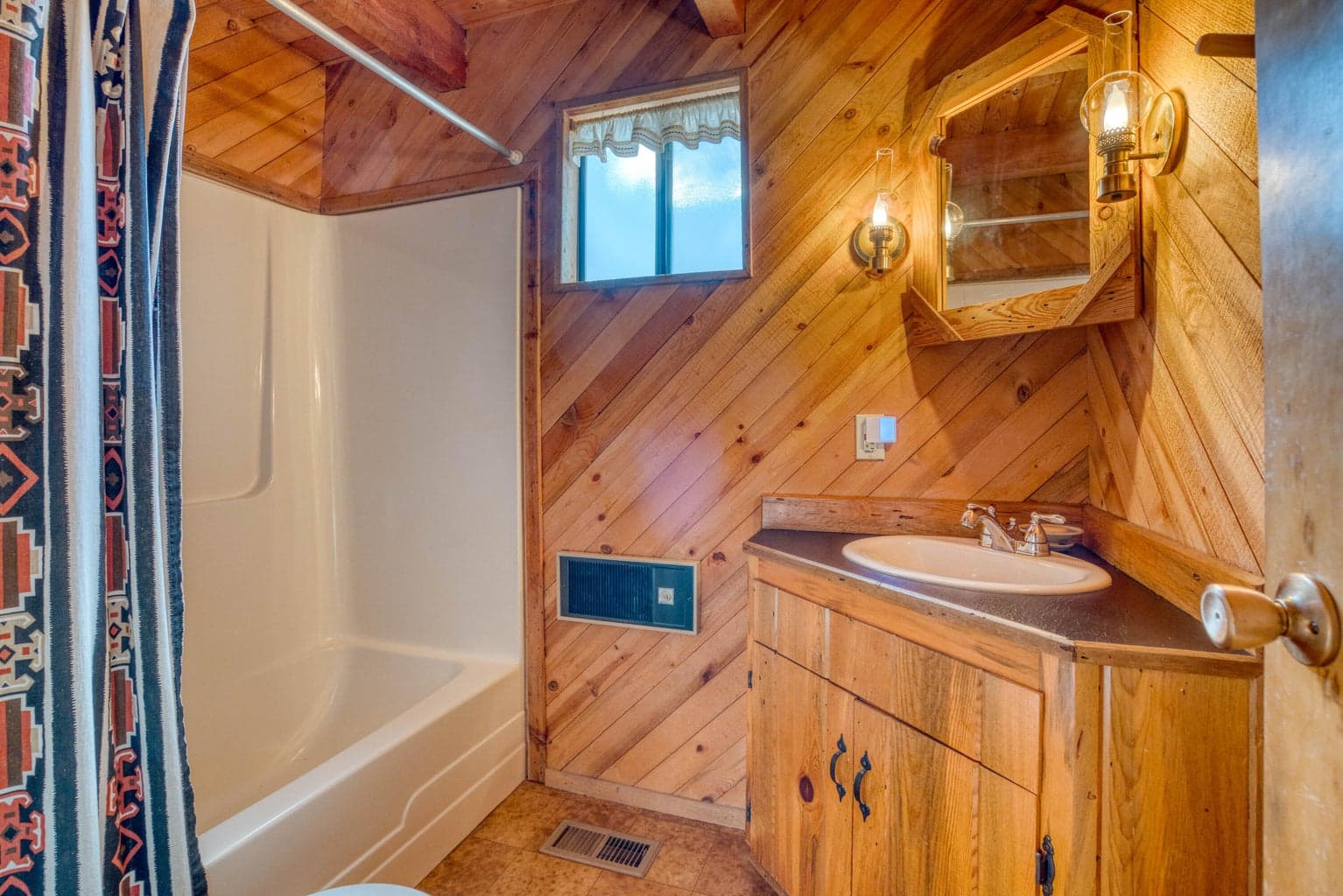 Adjacent to bedroom and great room.