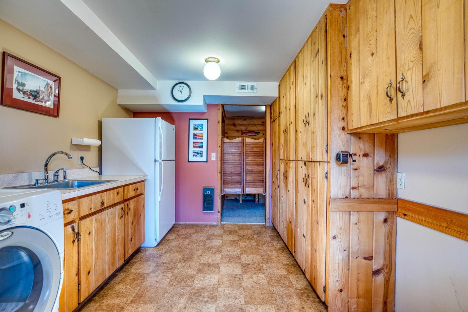 Great storage options and space for an extra fridge.