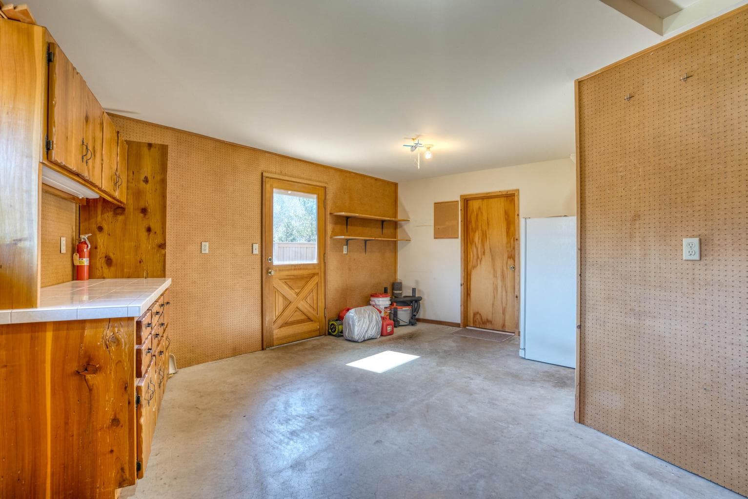 Direct access to the home and to the rear service yard.