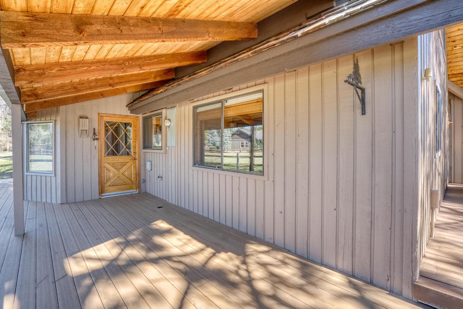 Enjoy outdoor cooking/dining under the covered porch.