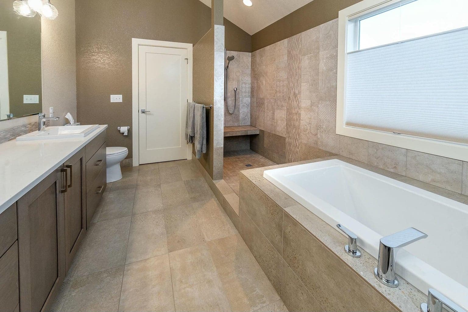 Beautifully updated primary bathroom with premium finishes for luxurious daily living.