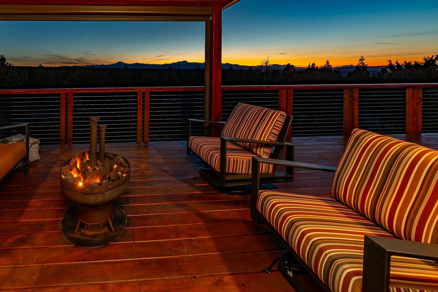 Expansive decks ideal for sunsets, entertaining, or morning coffee with mountain views.