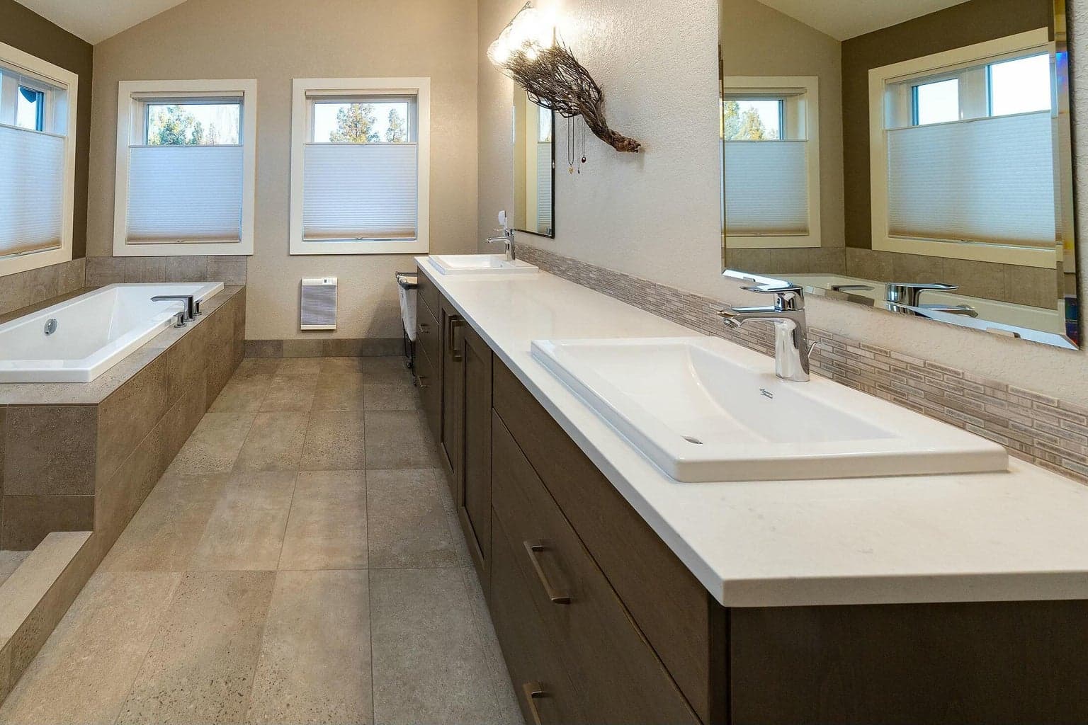 Soaking tub and upscale fixtures create a true sanctuary.