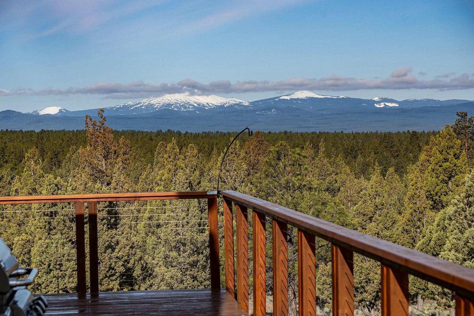 Elevated outdoor living space capturing unobstructed mountain vistas.