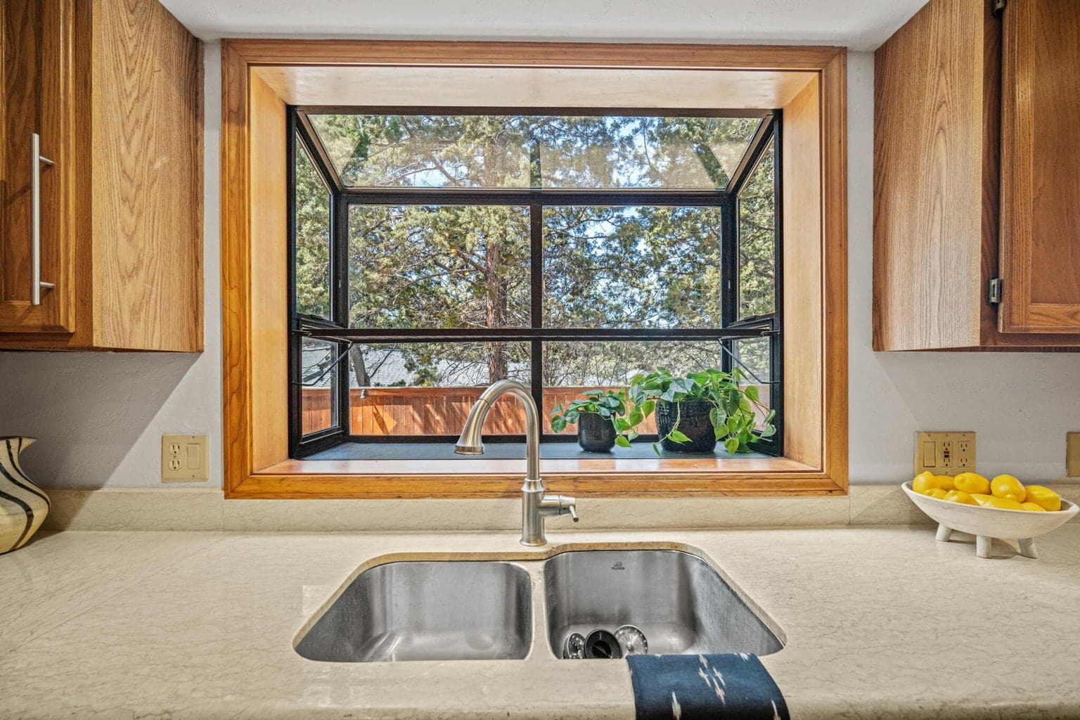 Garden window lets in so much light and allows for a small garden