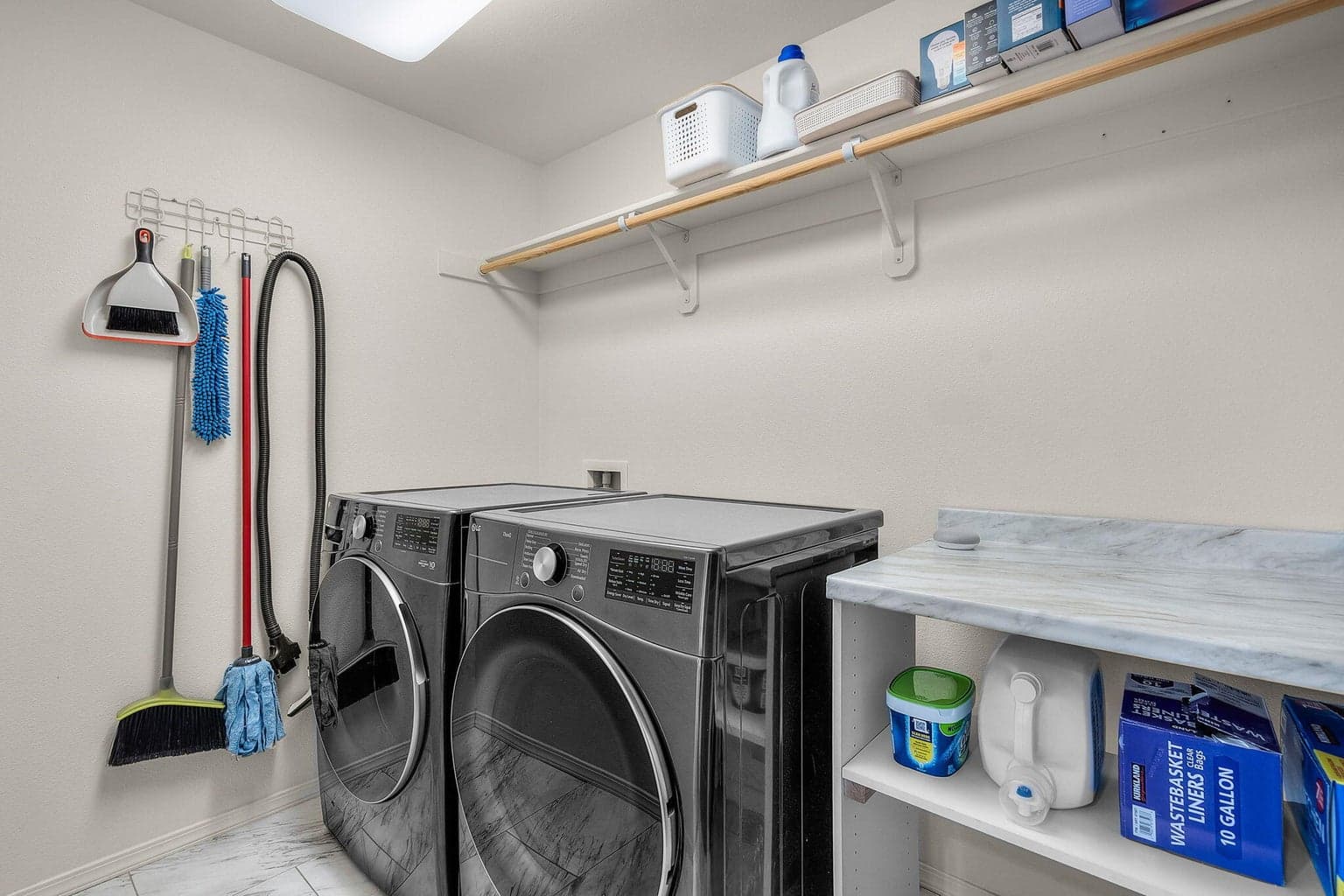 Upstairs laundry - washer and dryer stay with home