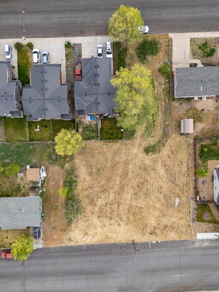 Paved streets and curbs already in this established neighborhood.
