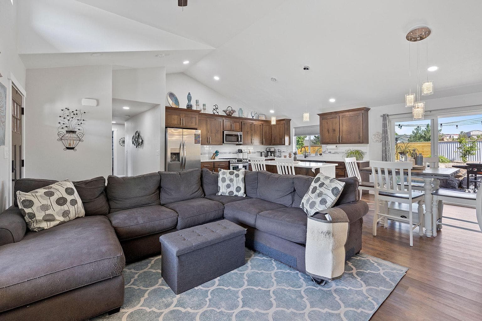 Open living area with vaulted ceilings