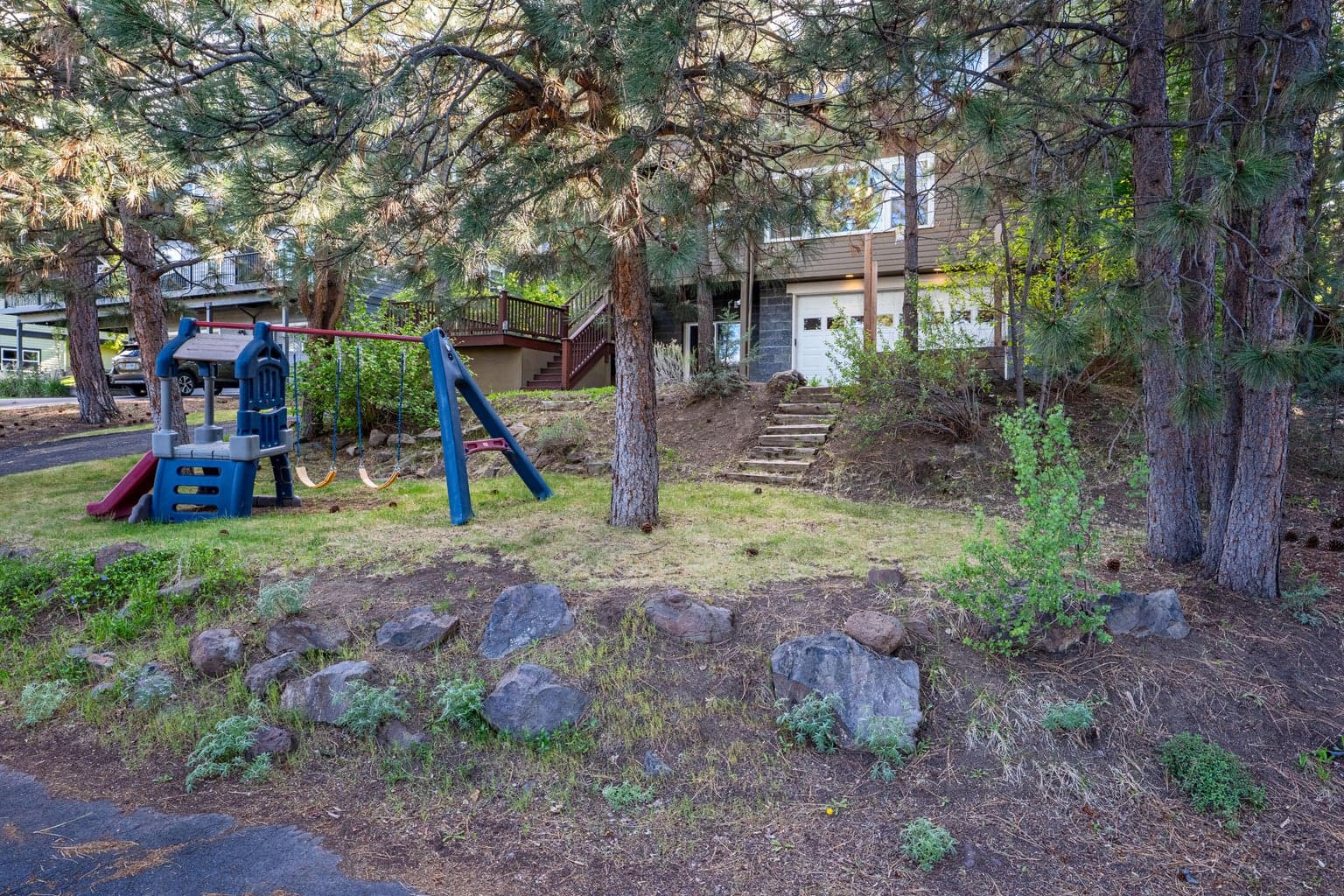 Lower level yard with playset