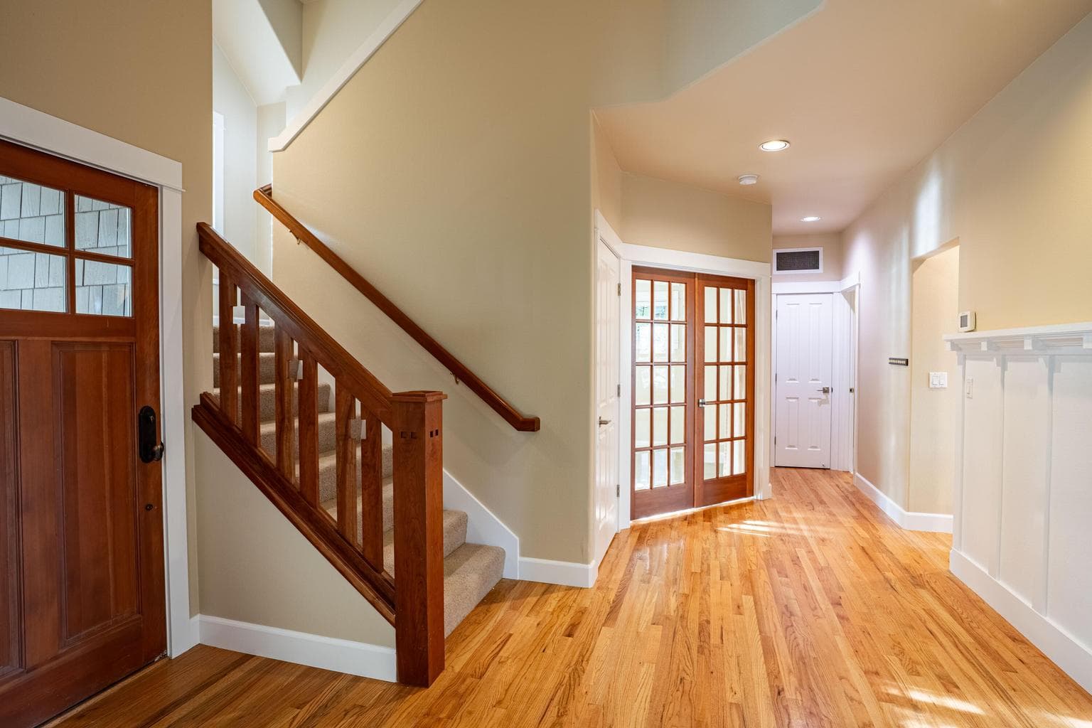 The main level office, full bath, and hall linen closet
