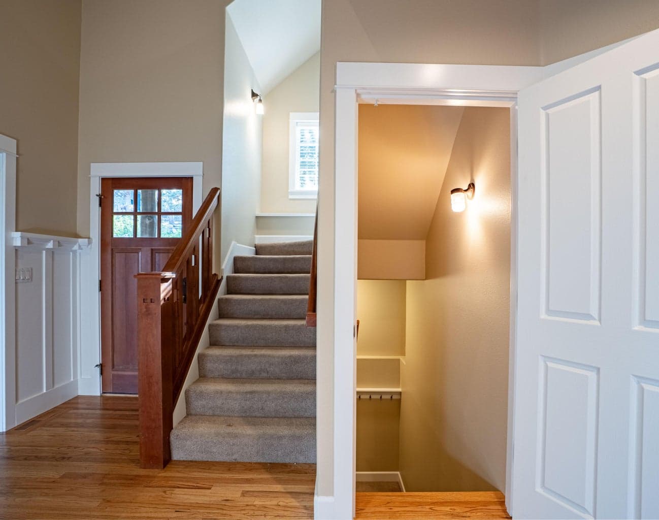 Upstairs to the bedrooms, downstairs to the garage and family/bonus room