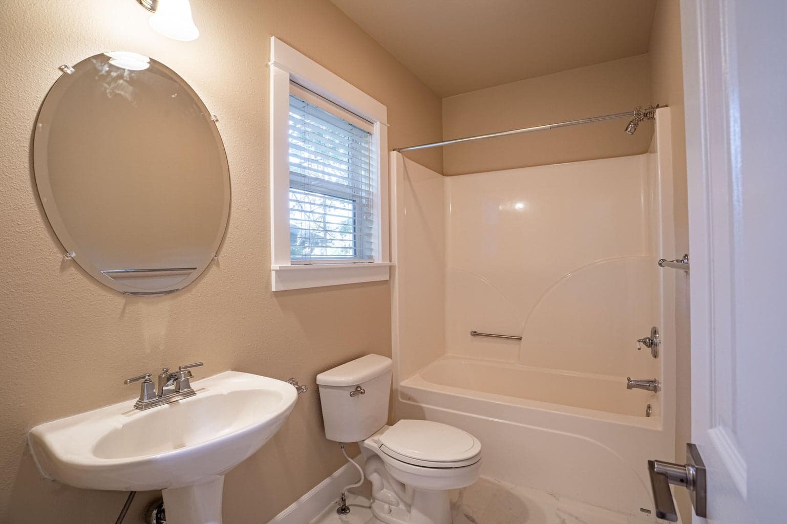 Full bath on the main level with updated LVT flooring