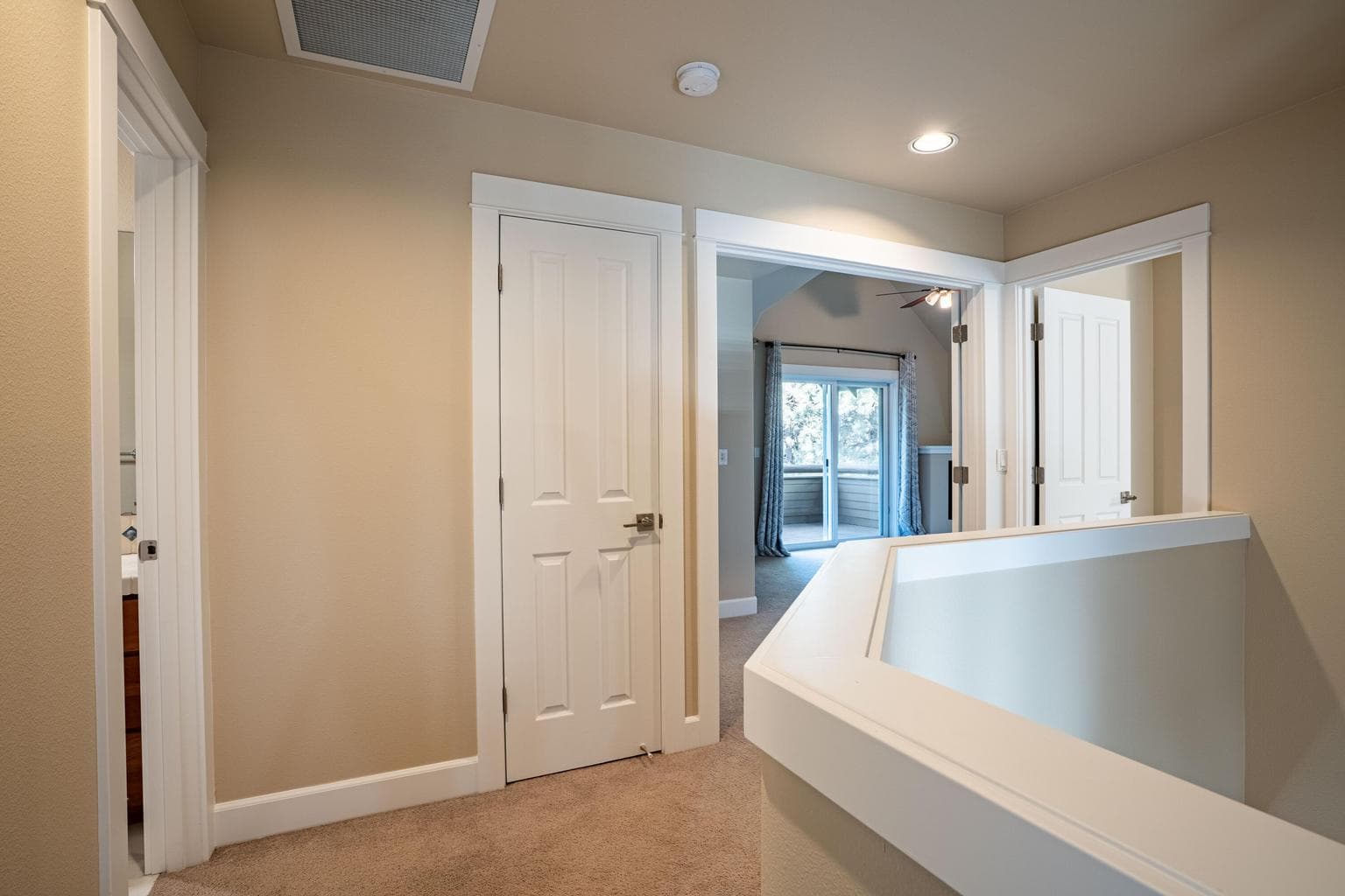 Hall linen and entrance to primary suite