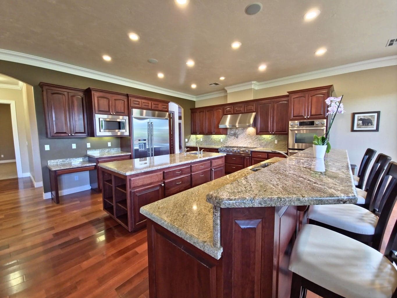 2 kitchen islands, jenn air appliances, granite counters