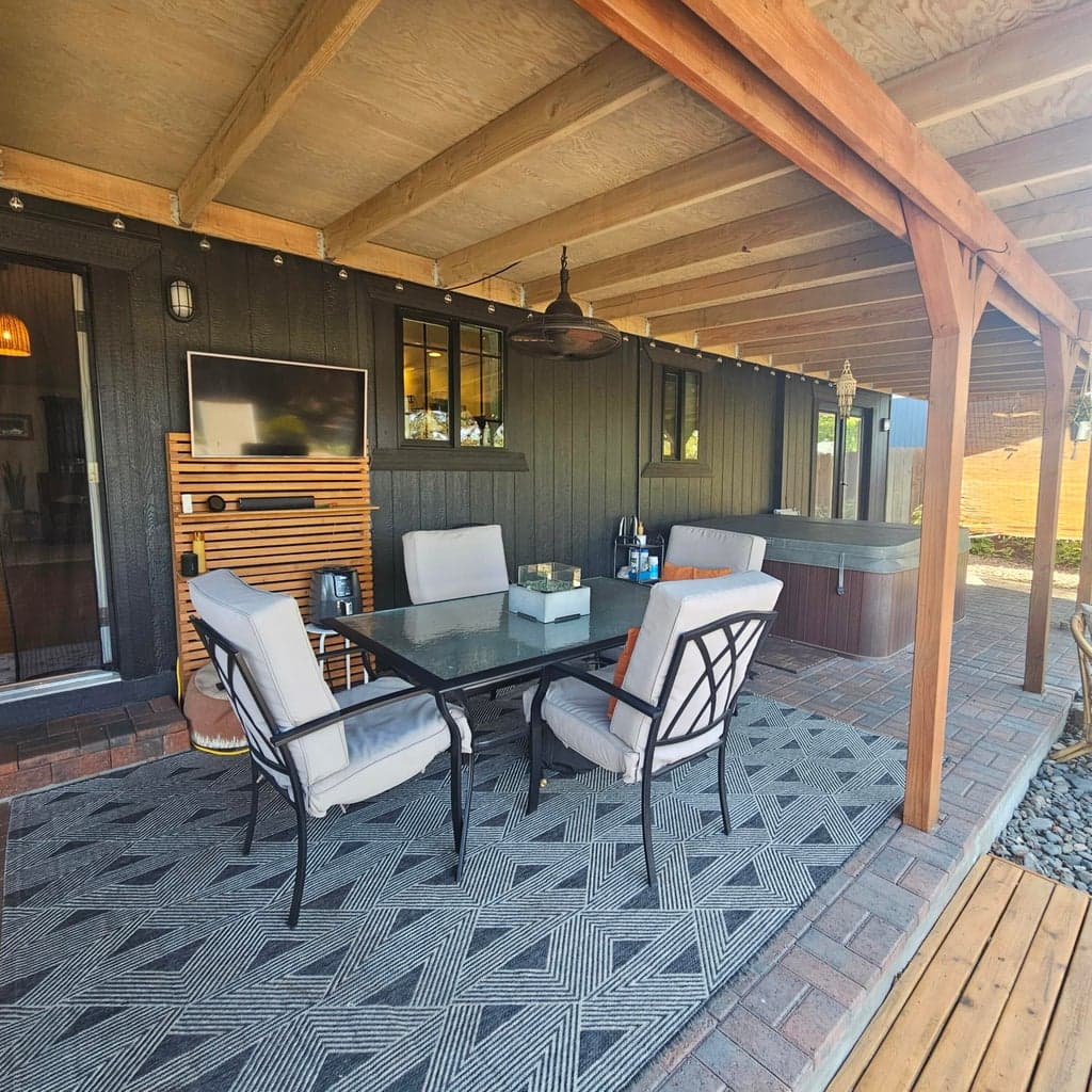 Coverd rear pave stone patio adds an additional three season space to enjoy BBQ's and sporting events.