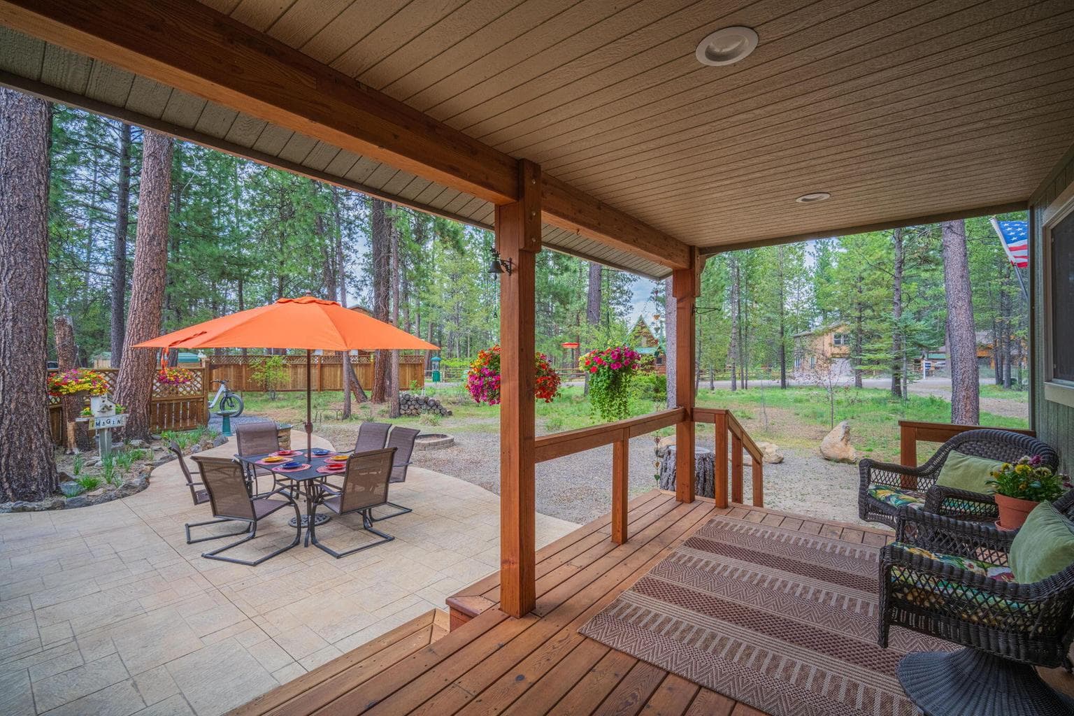 Covered front porch with stamped concrete patio