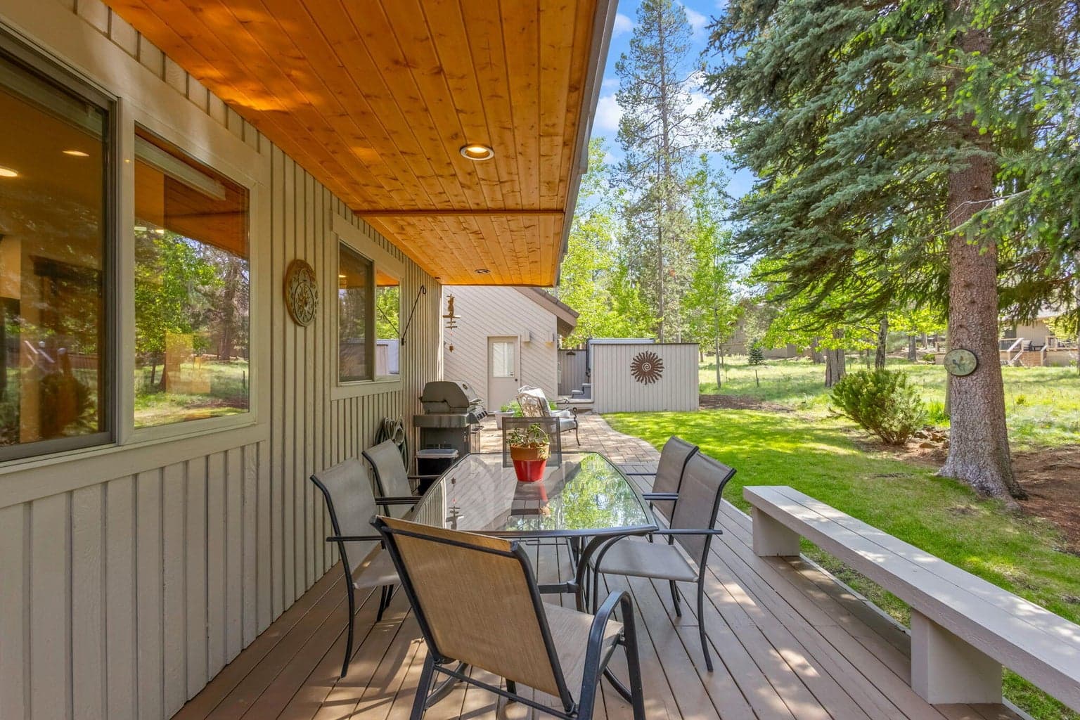 Back Deck with coverage, overlooking your landscaped yard