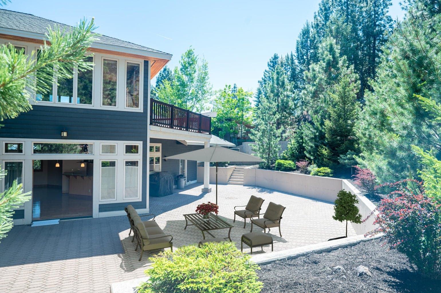 Large private, flat patio with deck off bonus as well.