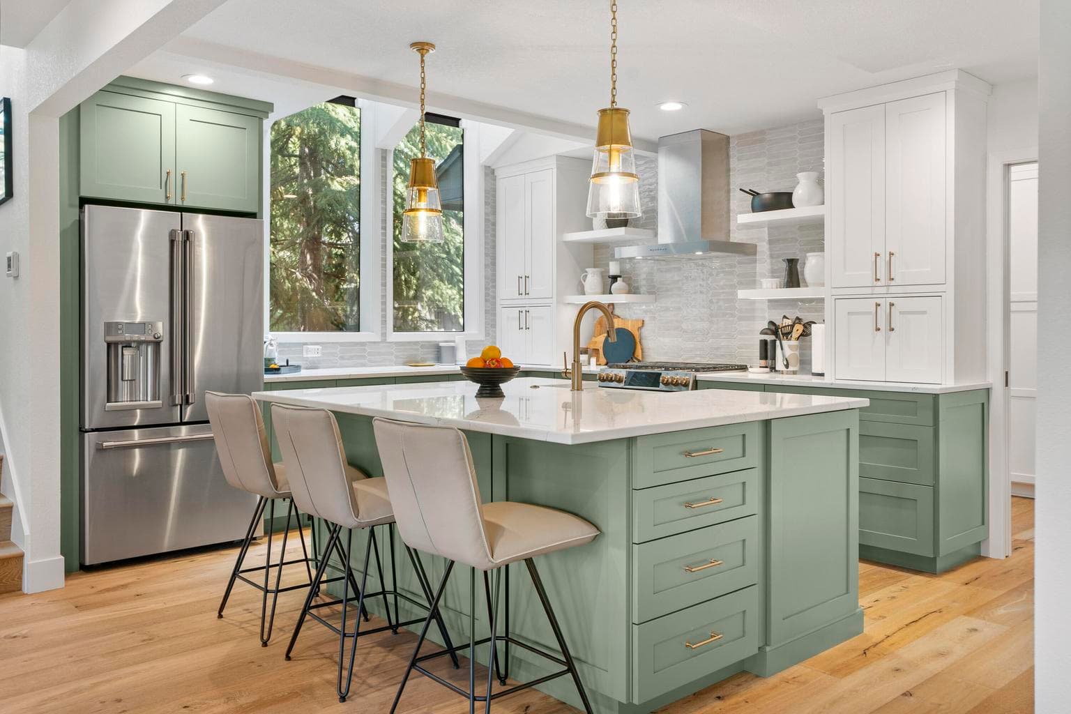 Quartz countertops, a farmhouse-style sink and stainless appliances.