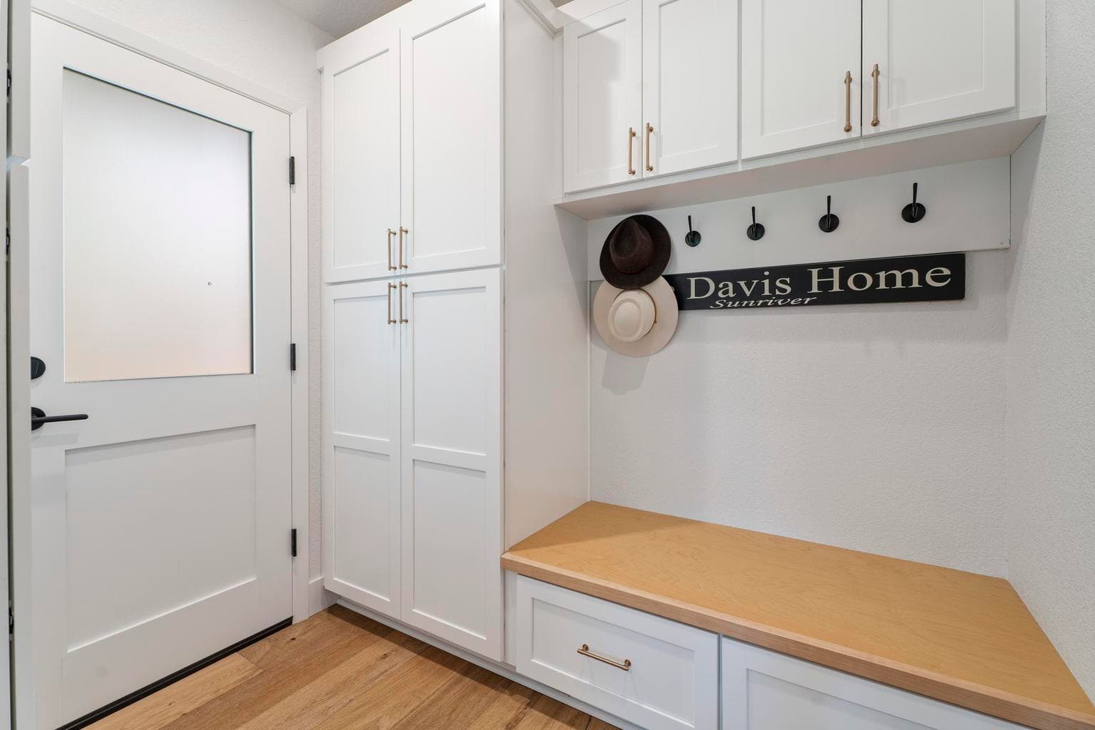 Updated pantry/mudroom leads to a 2-car garage.
