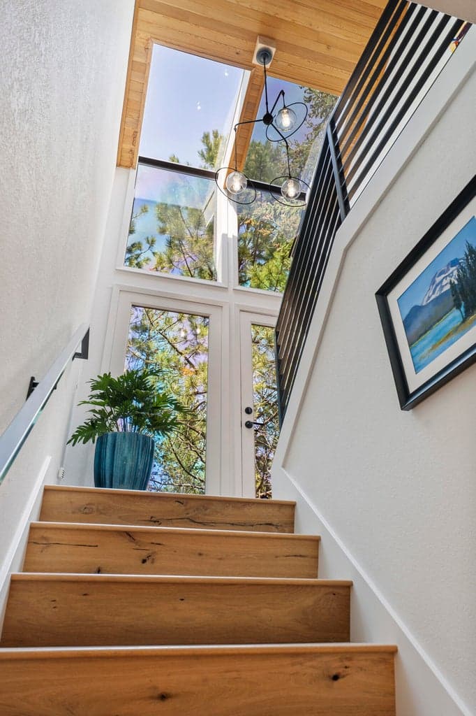 Upstairs is the primary suite, an additional bedroom and an office/flex space.