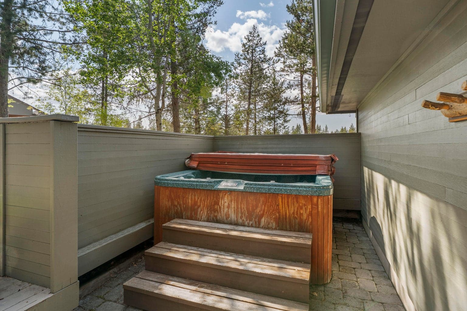 Private hot tub and indoor sauna for year-round relaxation.