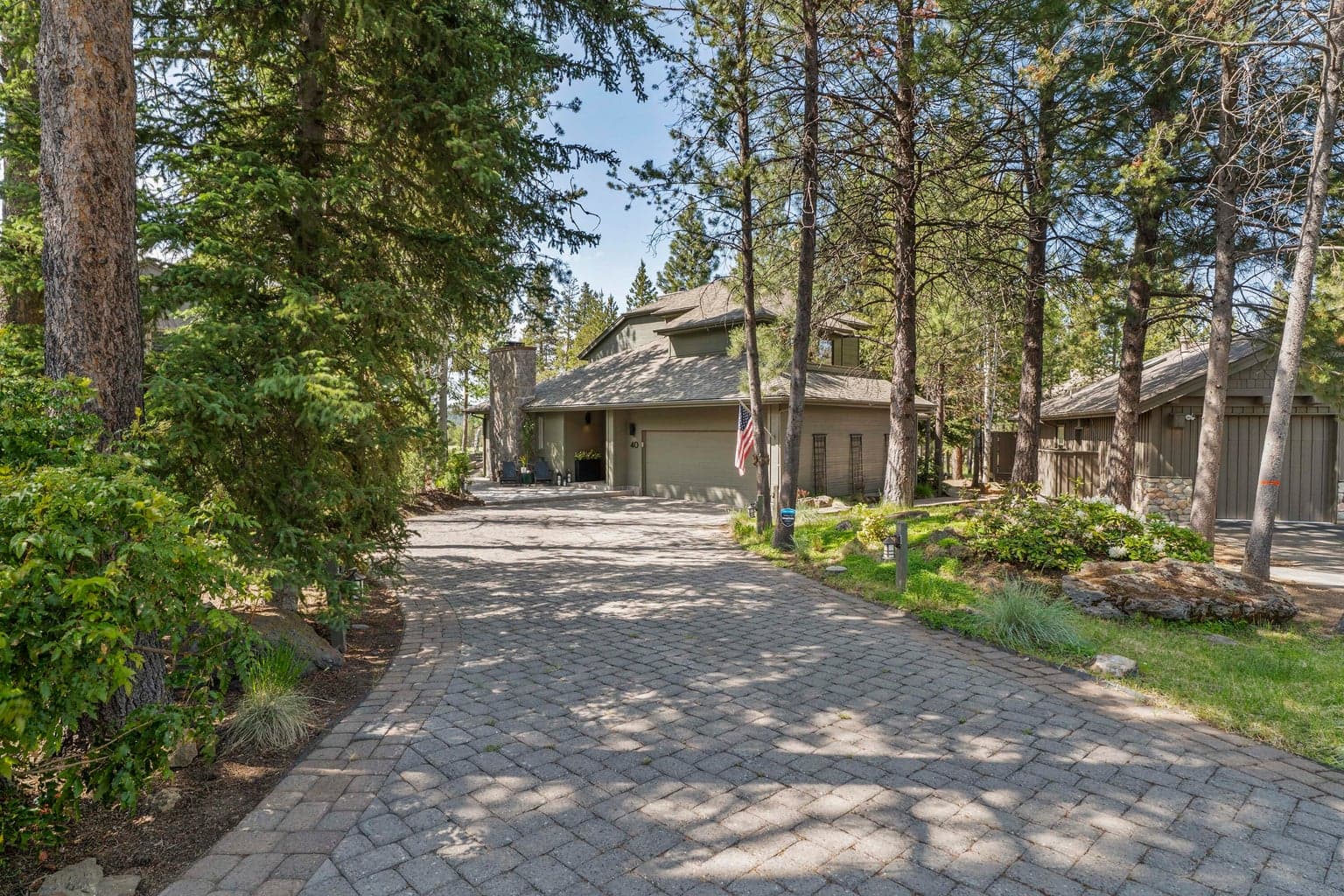 Spacious 2-car garage with built-ins and dedicated work area.