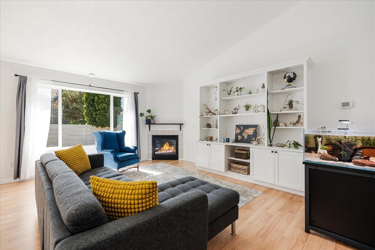 built in shelving in living room give plenty of room for decor, books or plants