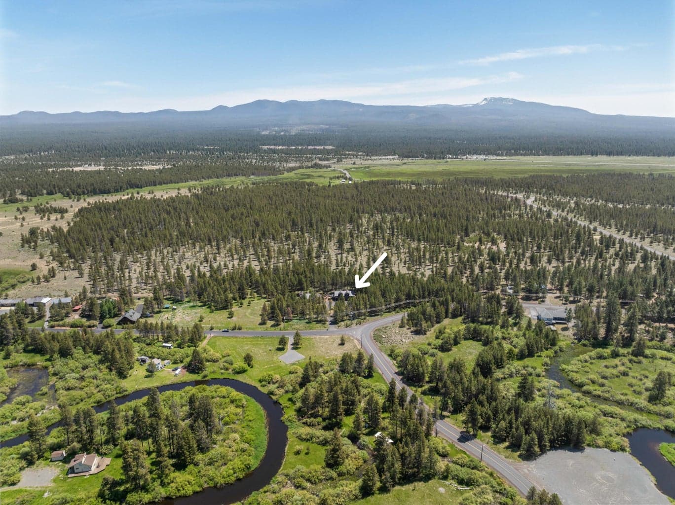 Aerial view reveals the home’s incredible backdrop of untouched BLM land—offering privacy, beauty, and room to roam.