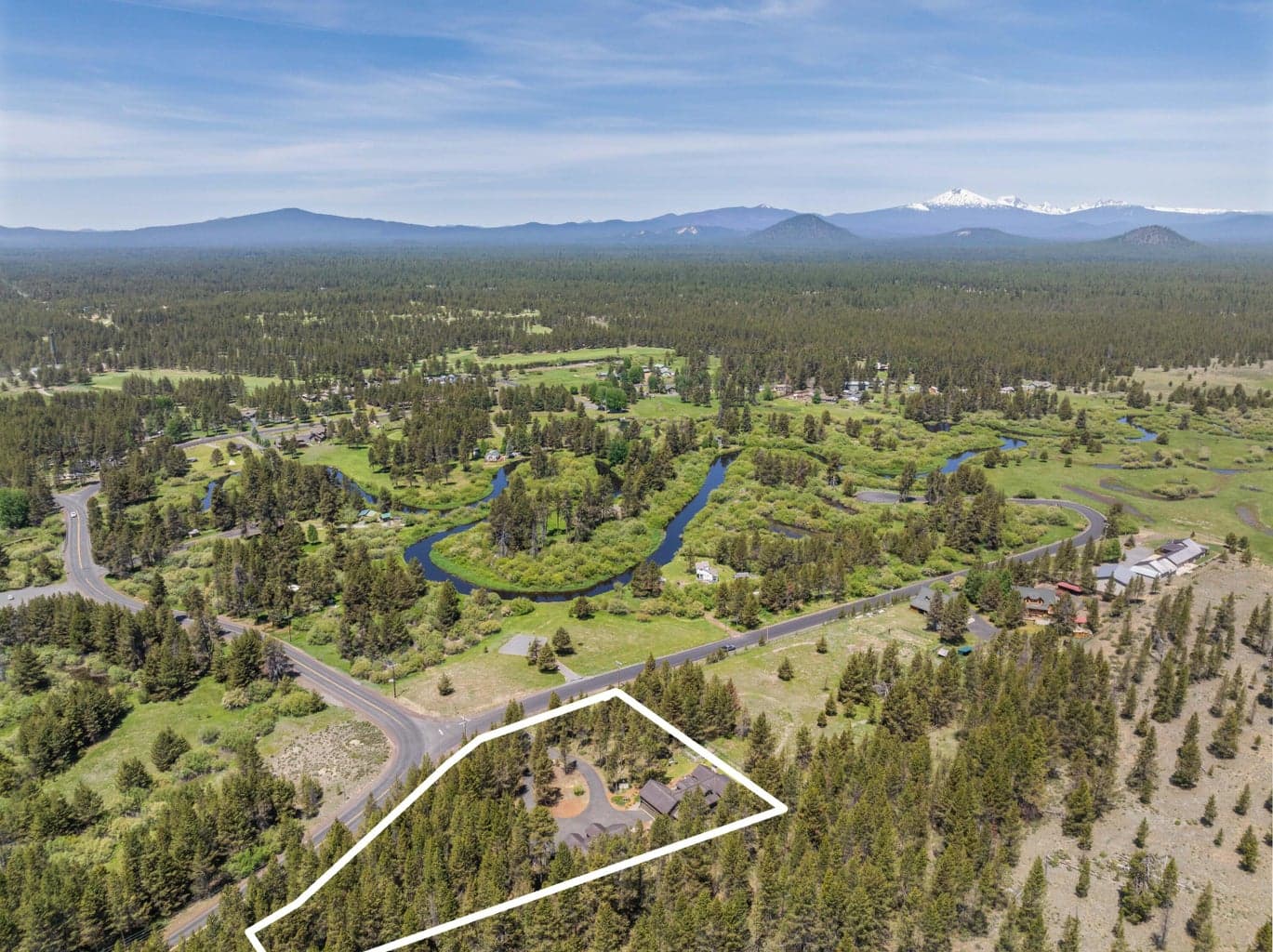 Aerial view includes a visual of the property boundary—highlighting the full scale and layout of your private retreat.