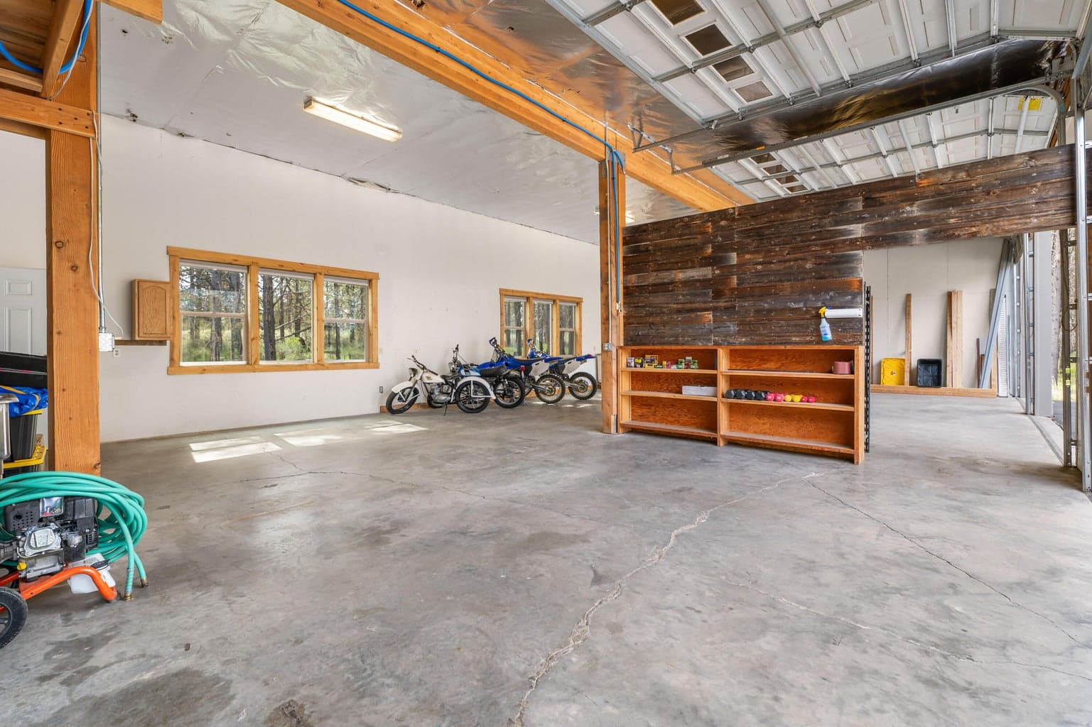 Abundant storage throughout the exterior garage—offering room for tools, toys, and everything in between.