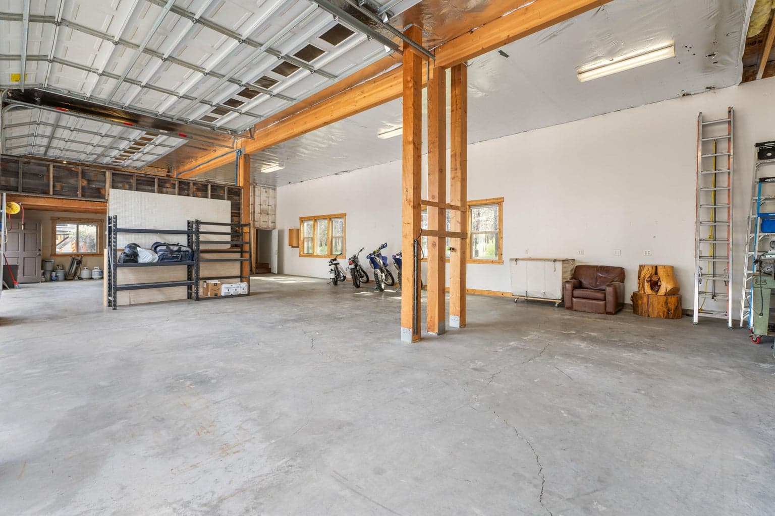 Garage features soaring ceilings—adding volume, versatility, and room for all your big ideas.