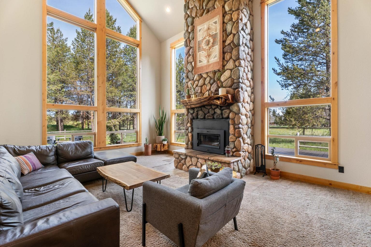 A stunning, oversized fireplace serves as the heart of the home—adding warmth, character, and a breathtaking focal point to your living space.