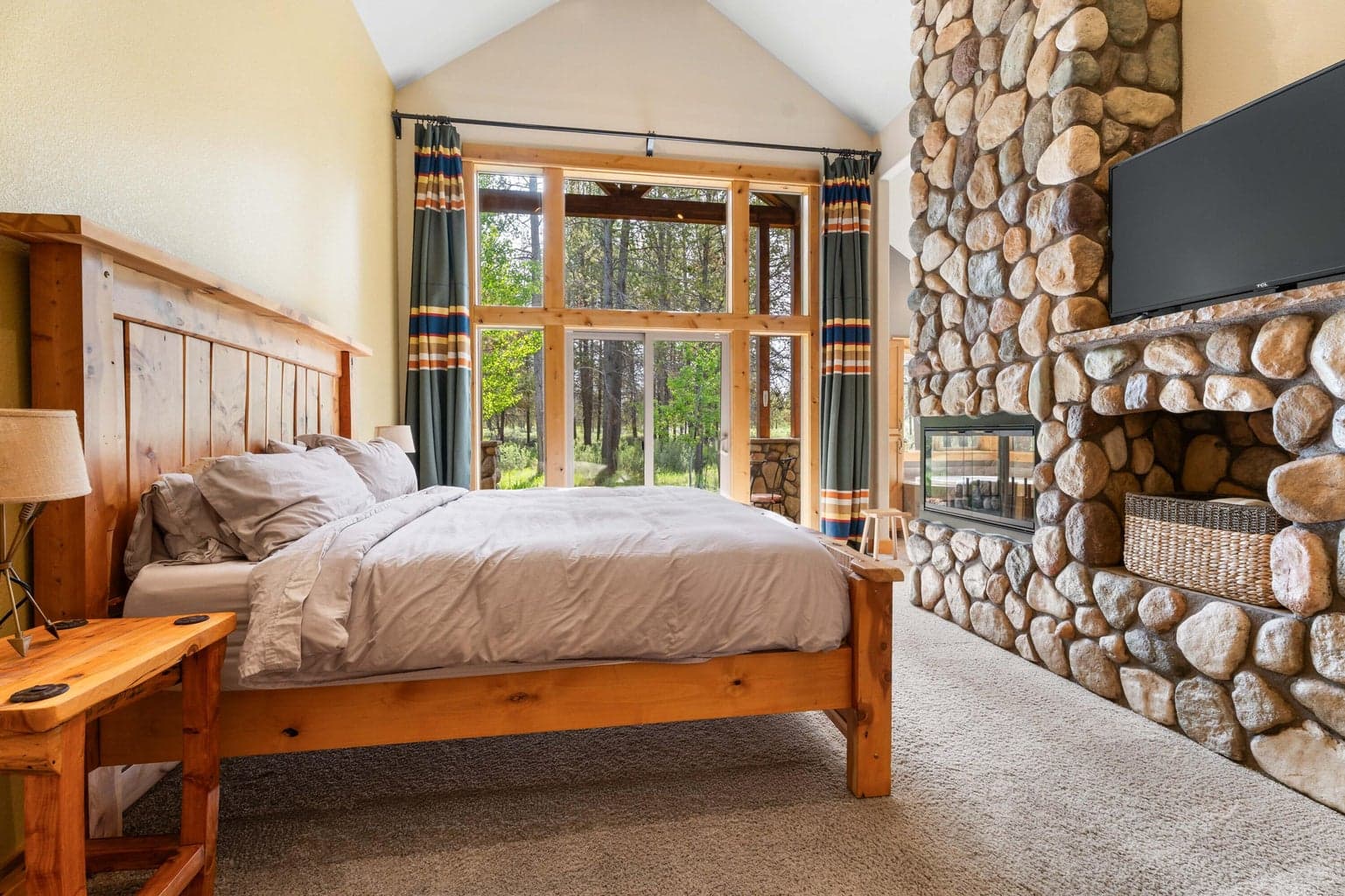 Retreat to your spacious primary suite featuring a private sliding door that opens onto a generous deck—perfect for morning coffee or evening stargazing.