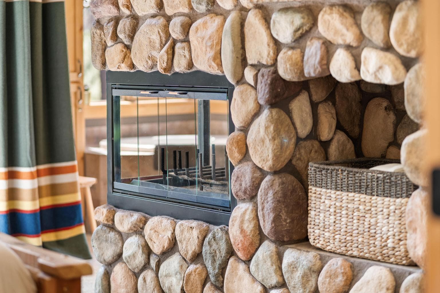 Enjoy the cozy charm of a custom wood-burning fireplace—crafted for comfort and timeless appeal.