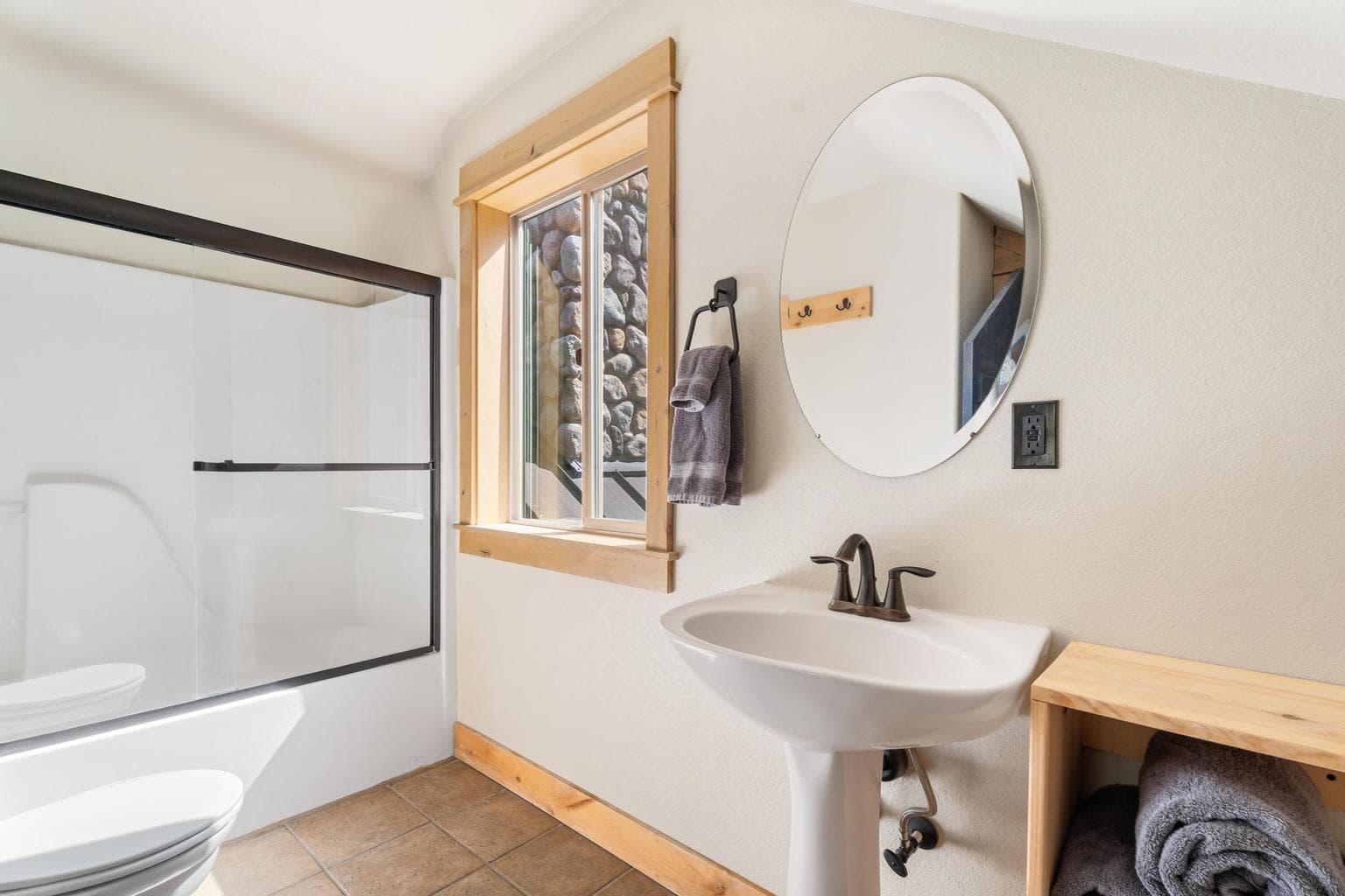 Upper-level bathroom features upscale finishes and modern touches—bringing everyday luxury to your routine.
