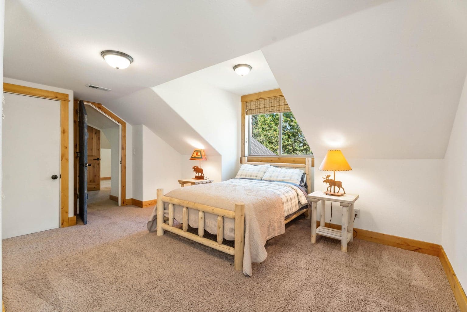Expansive upper-level bonus room with striking vaulted ceilings—ideal for a home office, game room, or creative space.