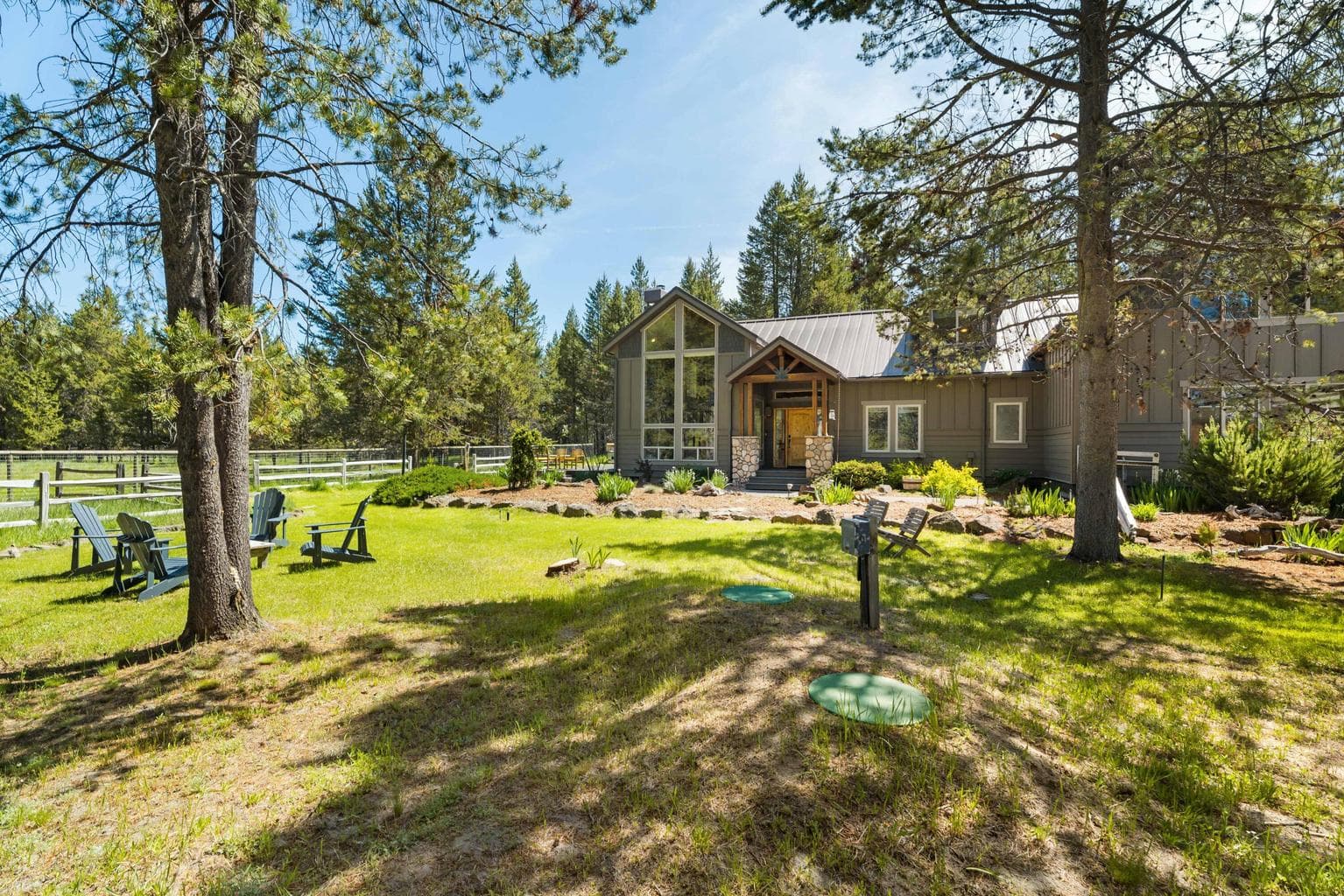 Expansive front greenspace offers a welcoming first impression—perfect for outdoor play, gardening, or simply enjoying the view.