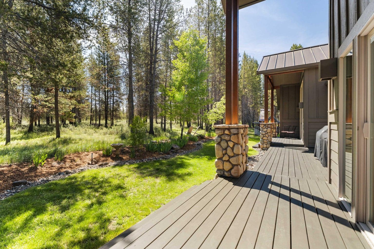 Take in the serene rear view, where the wraparound deck overlooks pristine BLM land—offering unmatched privacy and a front-row seat to nature.