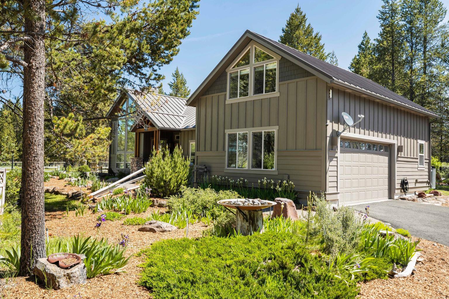 Beautifully landscaped grounds greet you from the circular driveway—offering a grand and welcoming arrival.