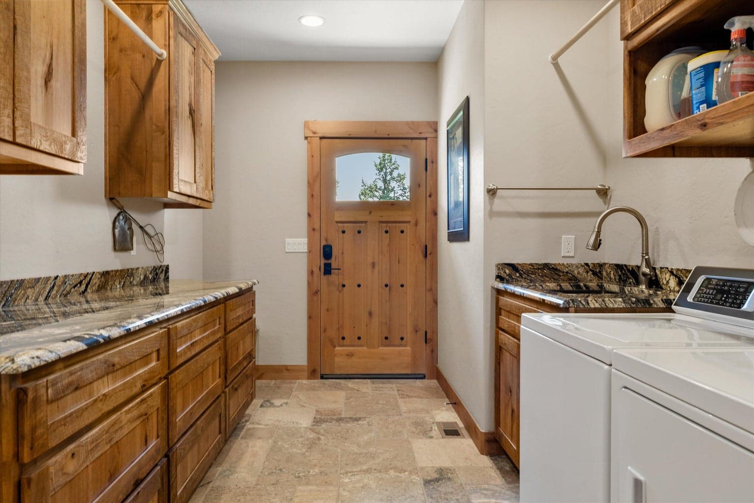 Laundry room with exterior door
