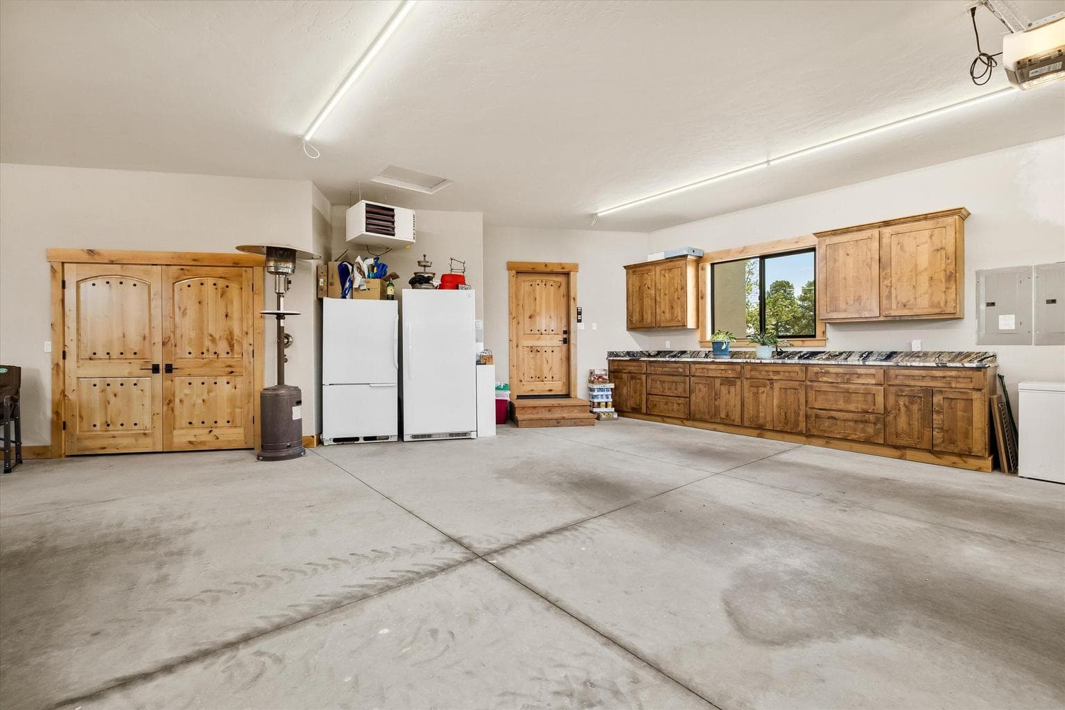 Garage has built in cabinets