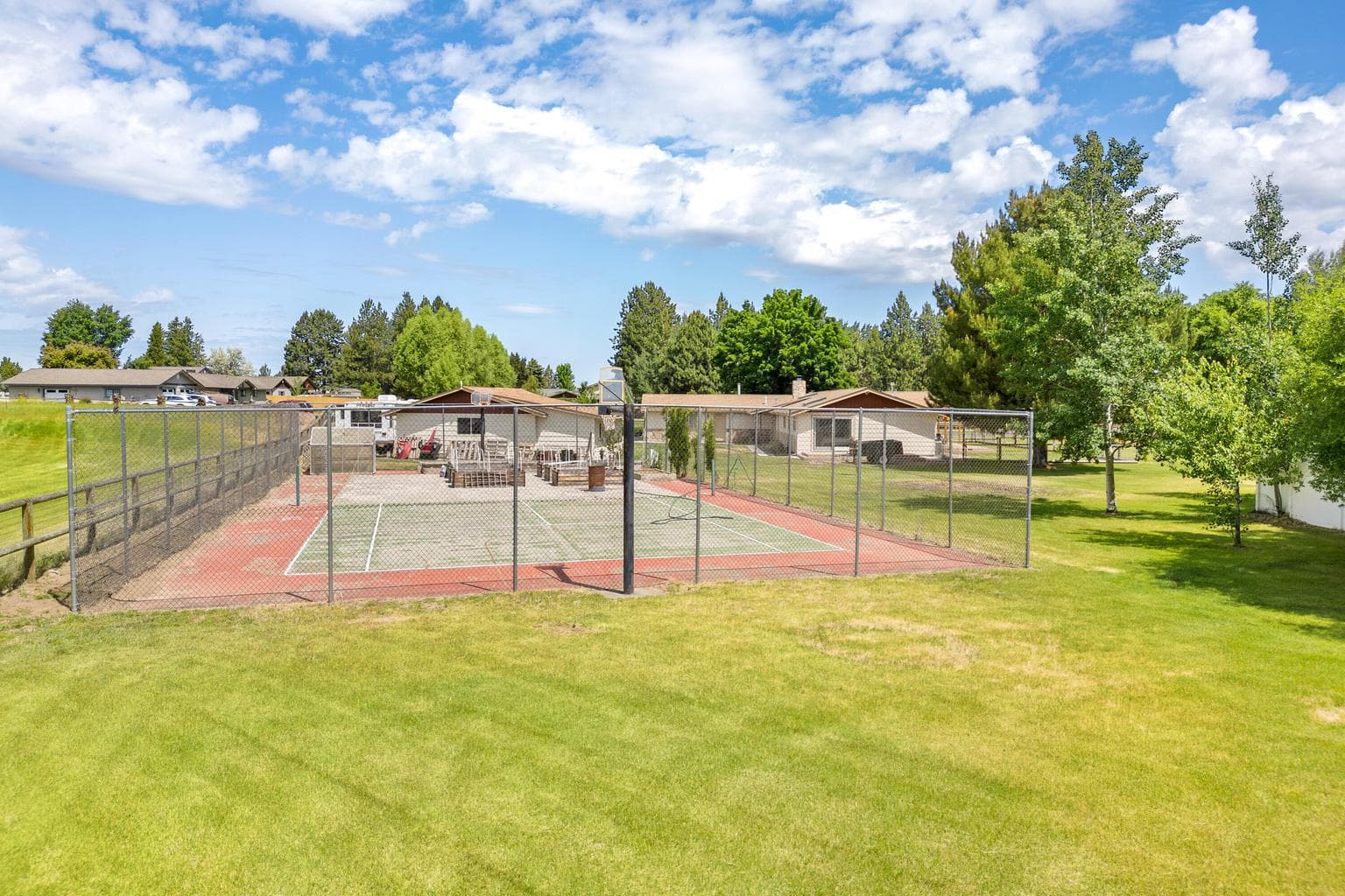 Tennis court that can be resurfaced or turned into pickleball courts if you choose.