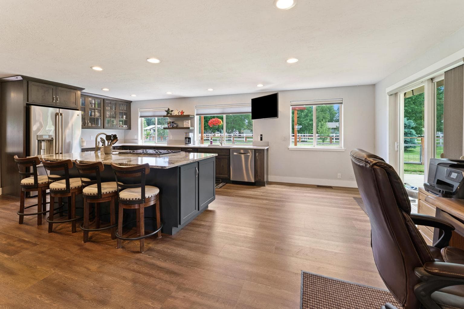 Remodeled kitchen with massive island, perfect for entertaining.
