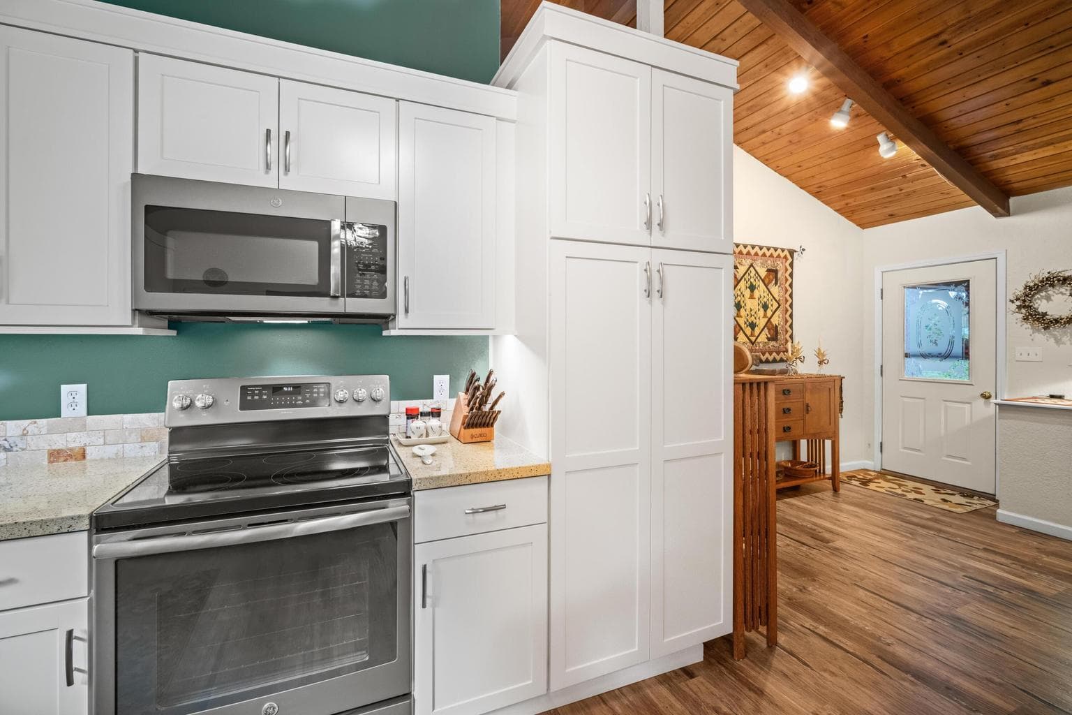 Pantry to the right of the stove