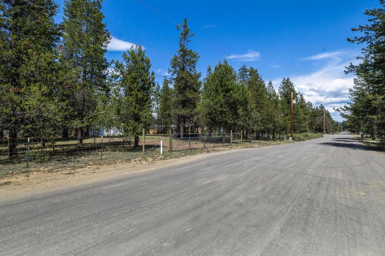 Looking east down Blackfeather Ln