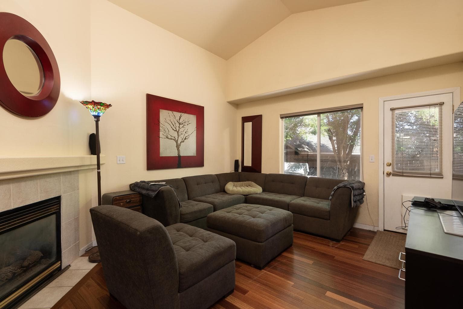 Central living area serves as divider of all three bedrooms.