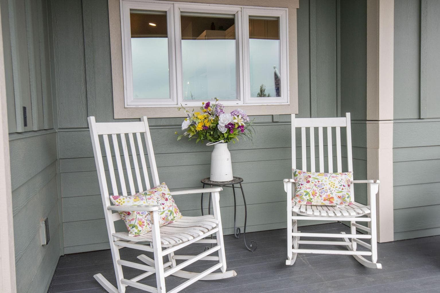 Darling front porch with mountain views