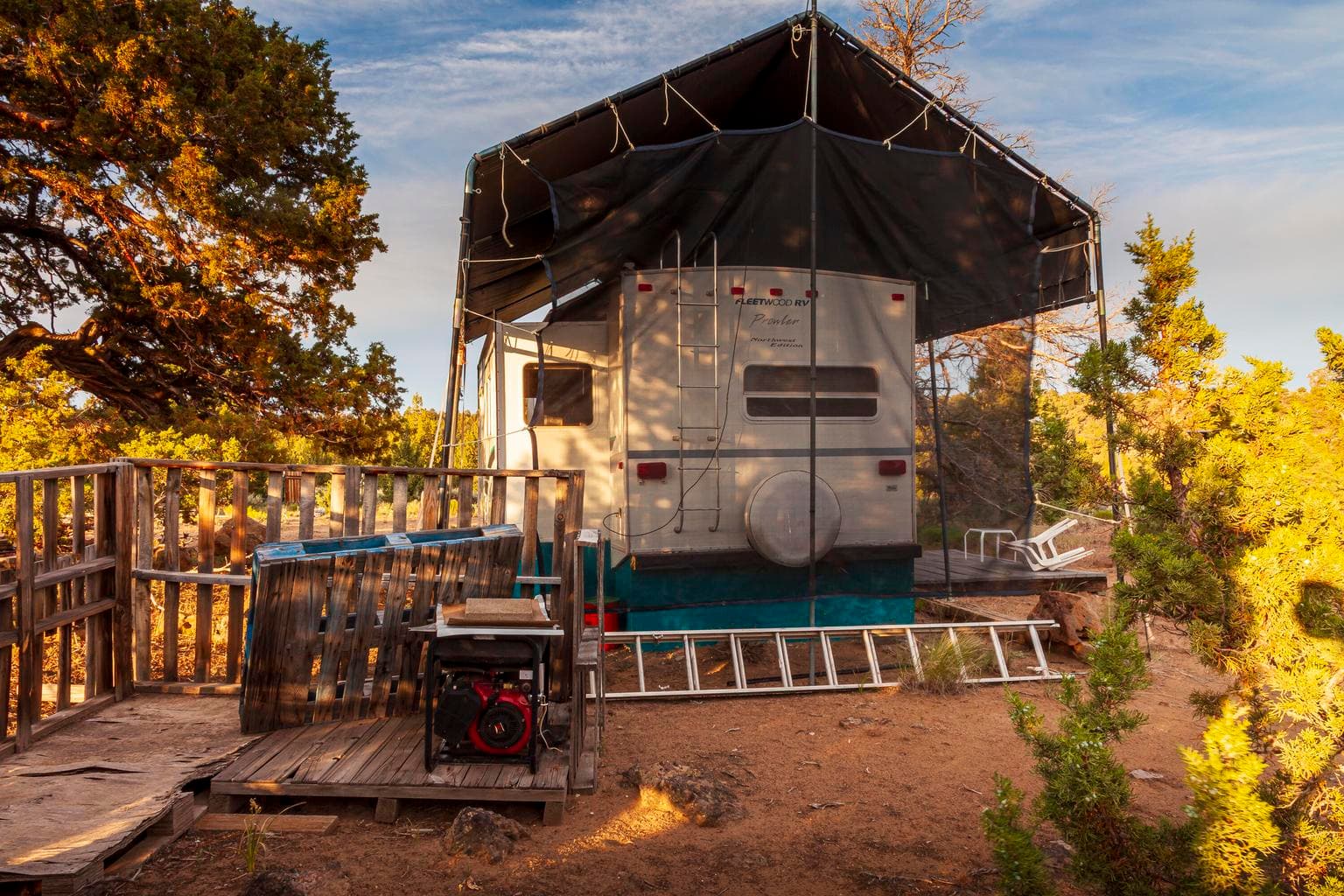 5th wheel with canopy, 15hp gas generator, & ladder are included in sale.